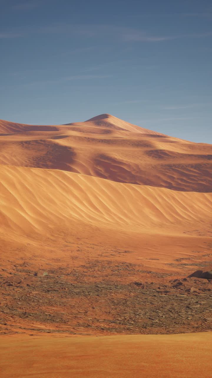Un paesaggio marziano con dune di sabbia rossa e un terreno roccioso