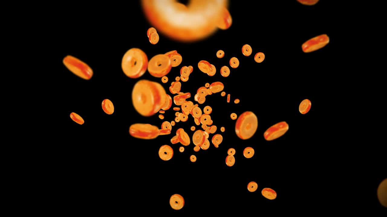 volando muchas rosquillas planas en fondo negro. pastel de rosquillas, dulces, postre. animación en 3d de la rotación de las rosquillas. animación de bucle.