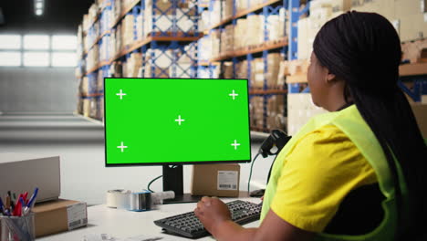 african american employee uses isolated mockup screen on computer