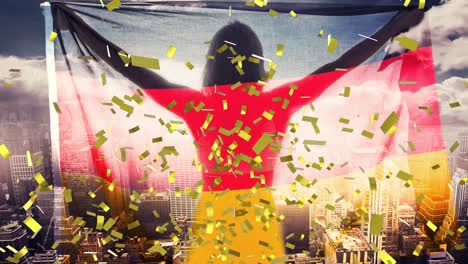 animation of confetti floating over woman holding german flag over cityscape