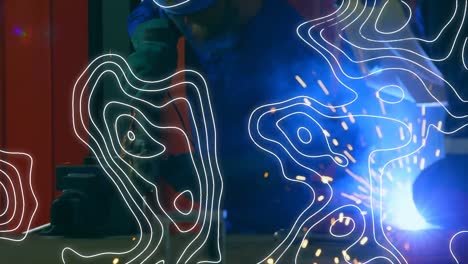 Animation-of-white-lines-moving-over-male-engineers-welding