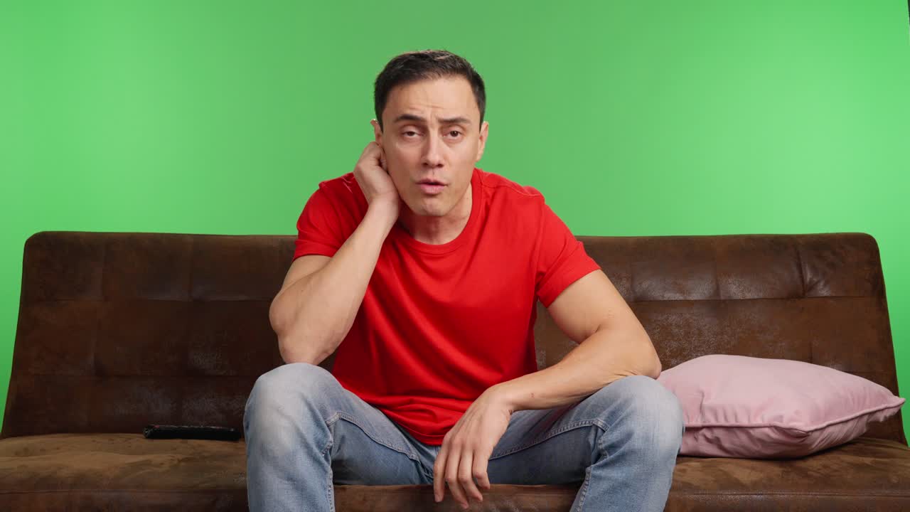 Excited sports fan celebrating goal on green screen