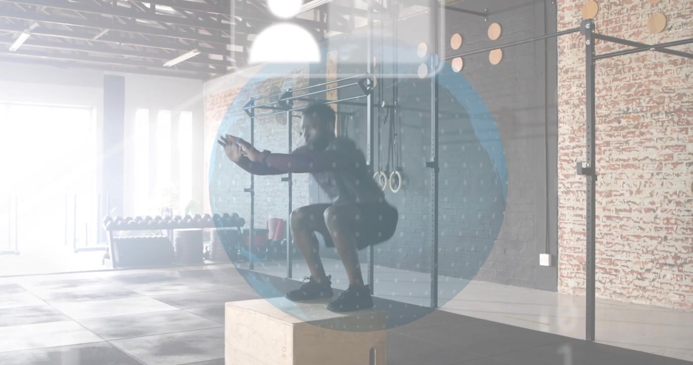 fitness trainer shifting into squat and jumping onto box as holographic UI measuring jump metrics
