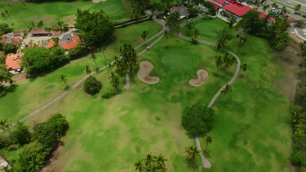 Wide aerial view of lush, tropical golf course at Flamingos Golf Club in Bucerías, Nayarit