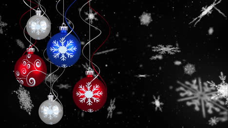 Animation-of-baubles-over-snow-falling