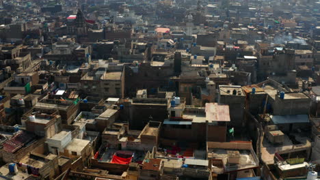 dense landscape of structural buildings at the city of rawalpindi during foggy morning in pakistan