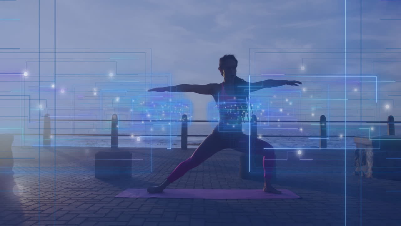 Person practicing yoga on waterfront with digital data overlay animation