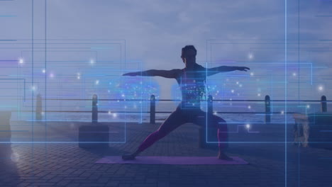 person practicing yoga on waterfront with digital data overlay animation