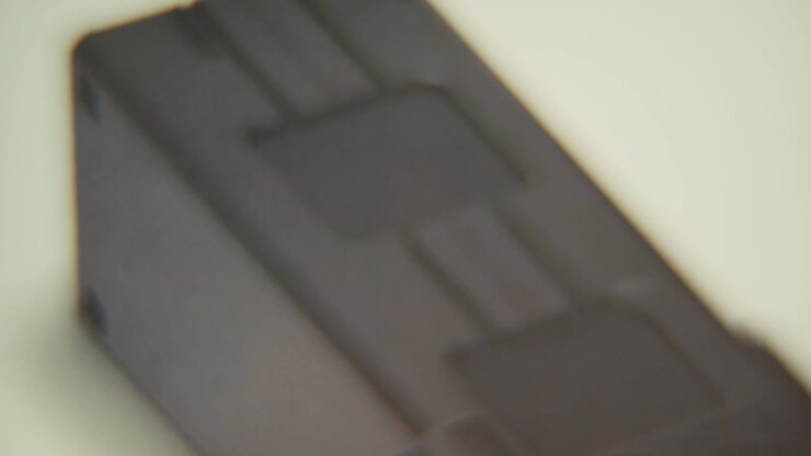 Macro video of a drone battery charger, close up shot
