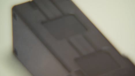 macro video of a drone battery charger, close up shot