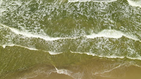 Stunning-Sea-Waves-From-A-Light-Green-Color-Deep-Ocean-In-Wladyslawowo,-Poland-On-Summer-Season