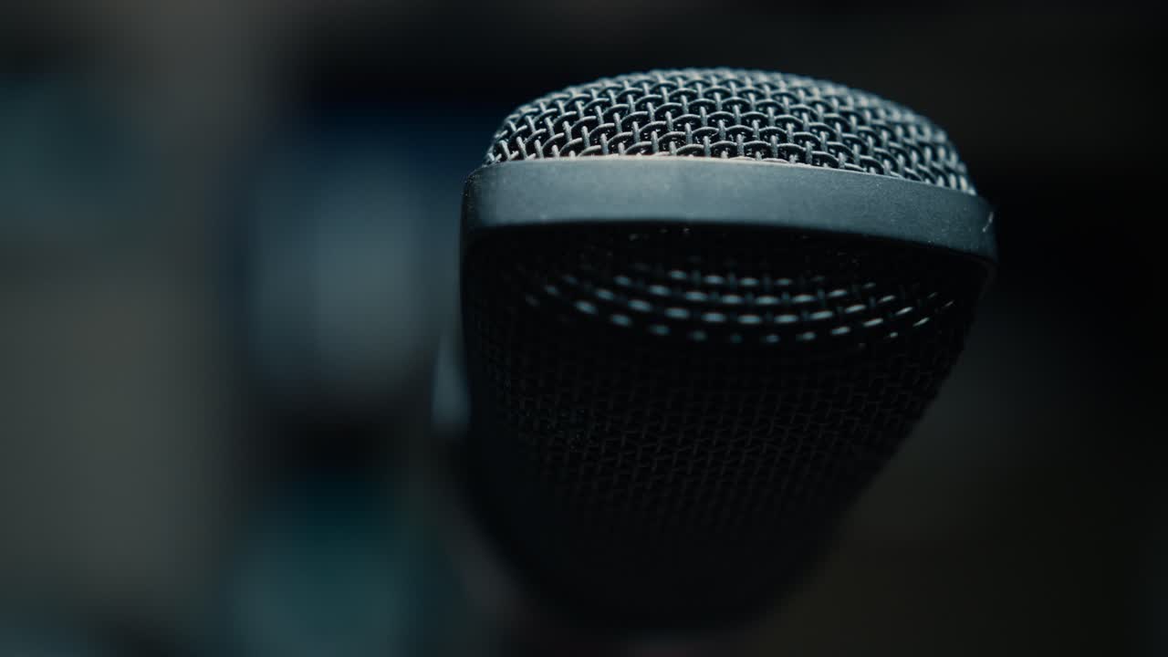 Close Up Rack Focus on a Black Microphone