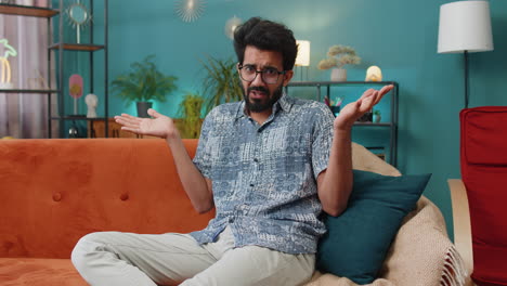 indian man guy asking why what reason of failure demonstrating disbelief irritation by troubles