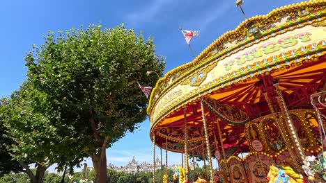 vibrant carousel spinning under a clear blue sky