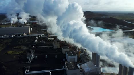 white thick smoke coming out on chimney of reykjanes power plant in iceland