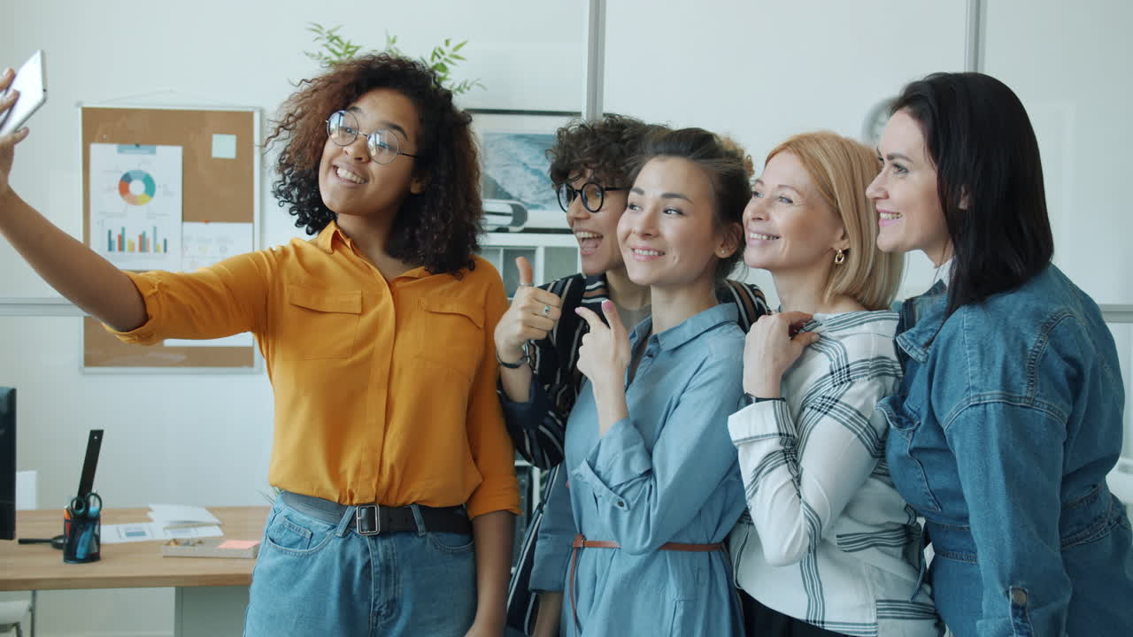Happy Women Team Taking a Selfie in the Office