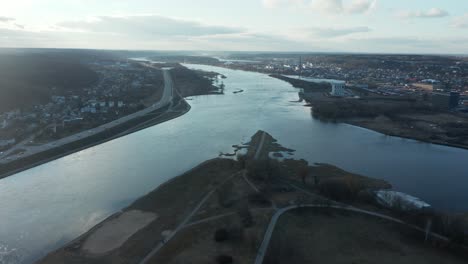 aerial: flying towards banks of the nemunas river with confluence to neris river