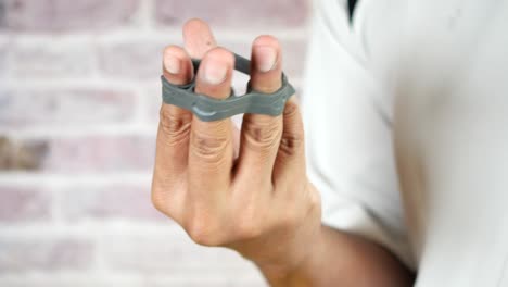 hand and finger exercises with a silicone strengthener