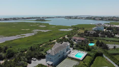 drone flying over a home in the hamptons