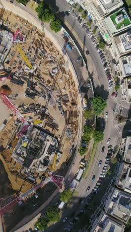 verical top down statice shot above the impressive project construction in kikar (square) hamedina - tel aviv