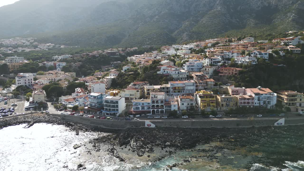 Aerial View of a Colorful Coastal Town on a Hillside