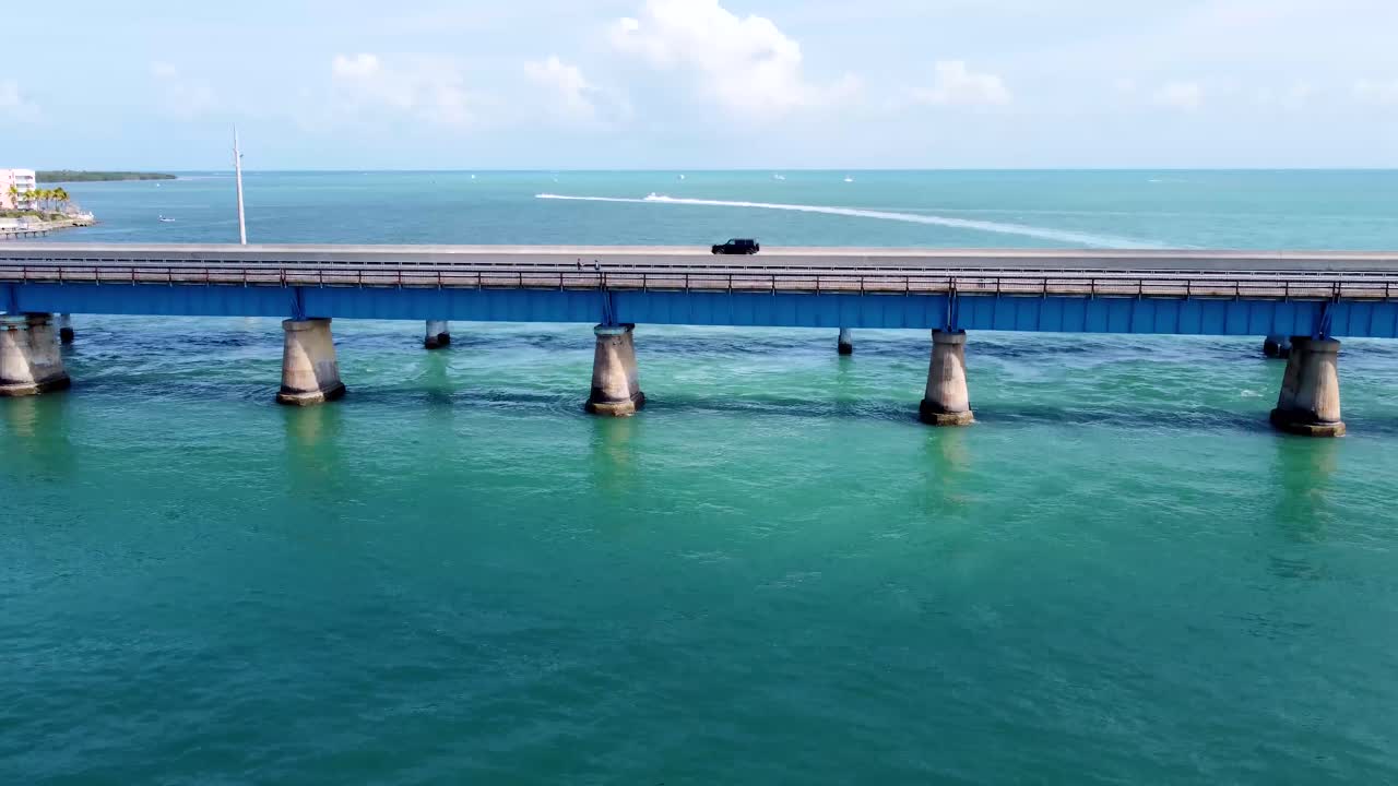 Aerial shot of the Seven Mile Bridge in Florida which connects several of the Florida Keys on the way to Key West. Florida Keys 2025 drone shots flying over new Seven mile bridge