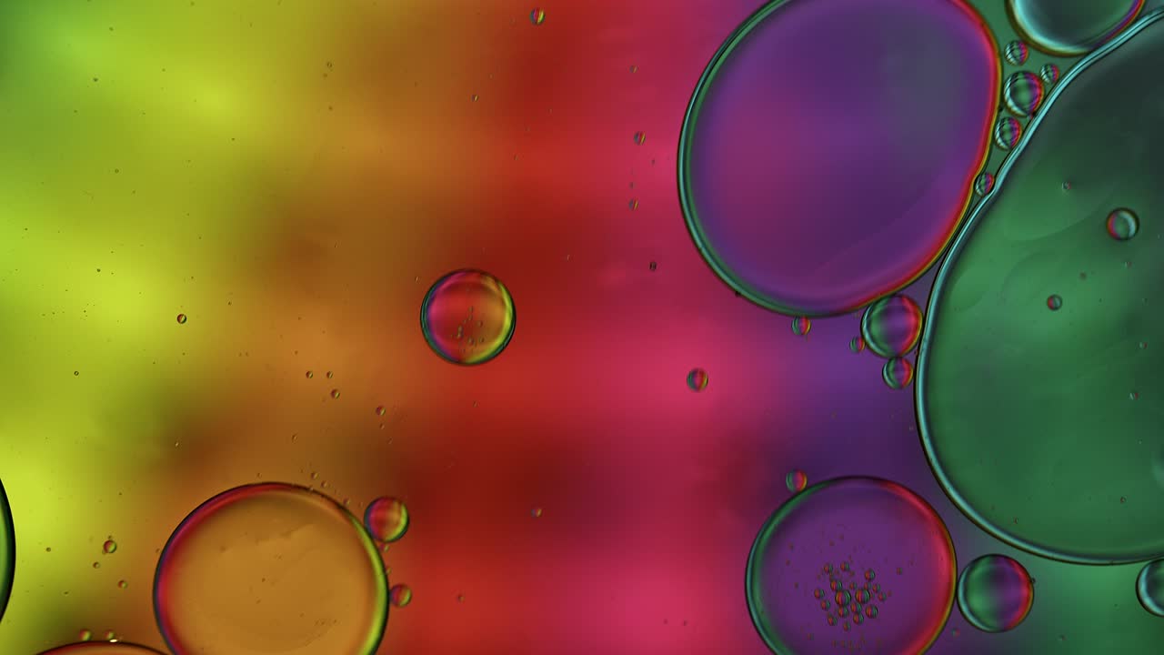 Abstract Colorful Food Oil Drops Bubbles and spheres Flowing