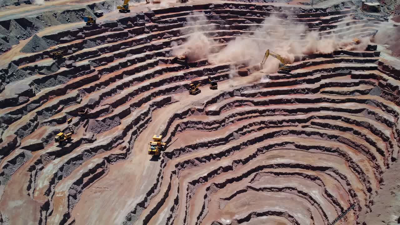Aerial View of an Open-Pit Quarry with Heavy Machinery