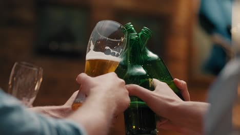 friend with beer glass making a cheers