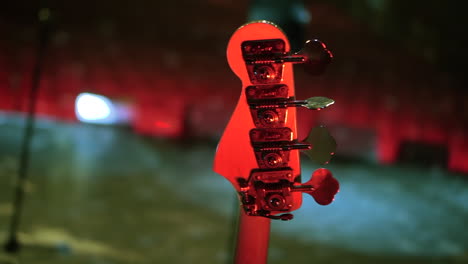 guitar bass on stage live performances when chair crowed in background are empty