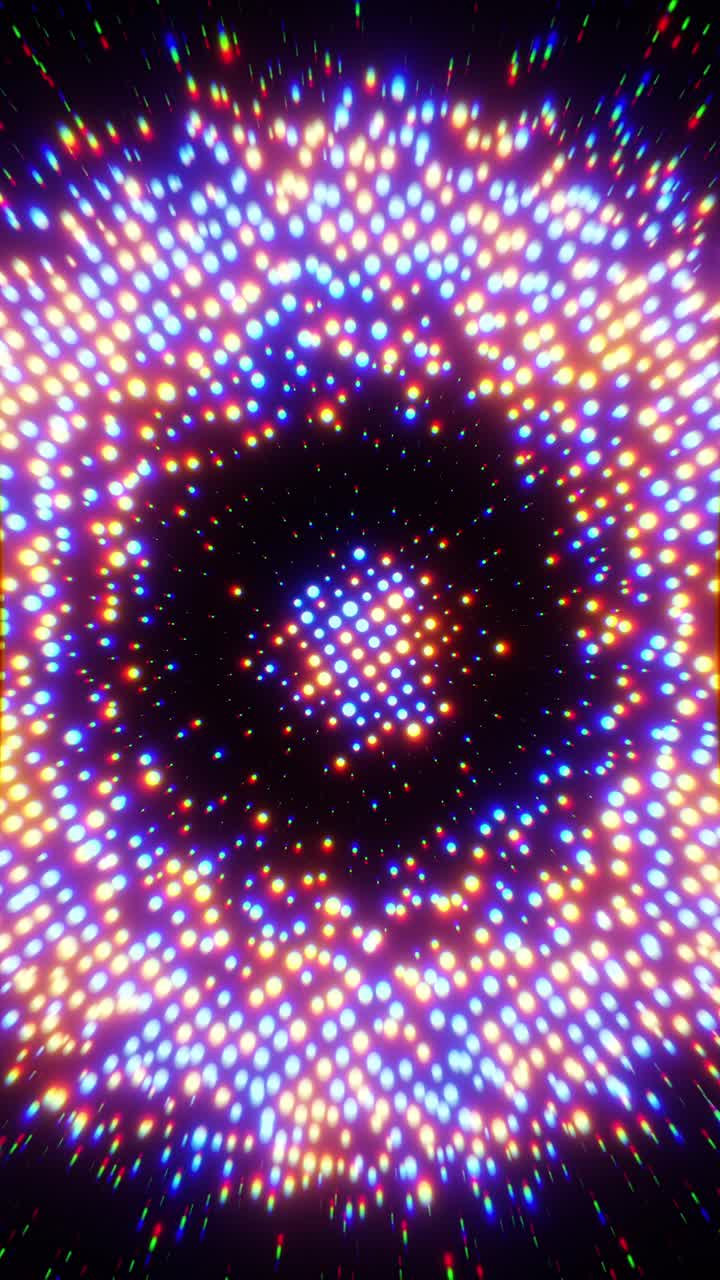 Punti multicolori che si muovono a ritmo di musica. Video in loop verticale.