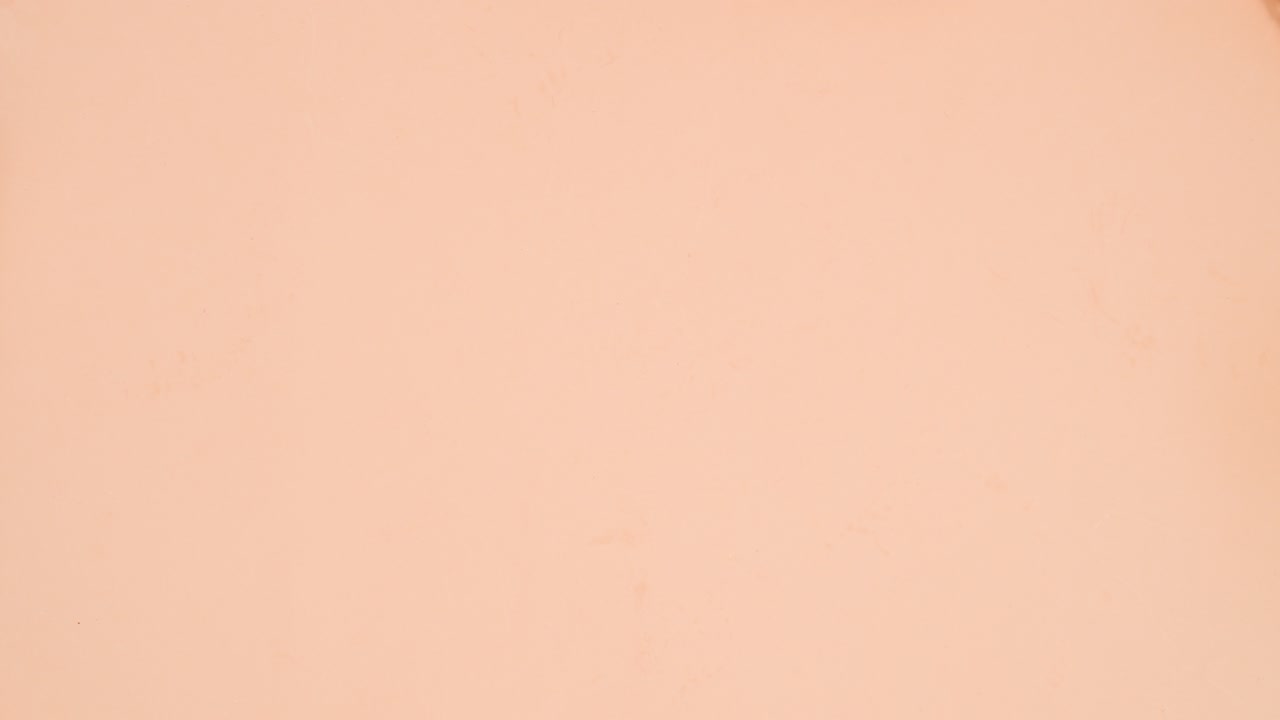 fondo naranja brillante pastel con postres dulces, galletas, dulces y piruletas. dejar de moverse plana