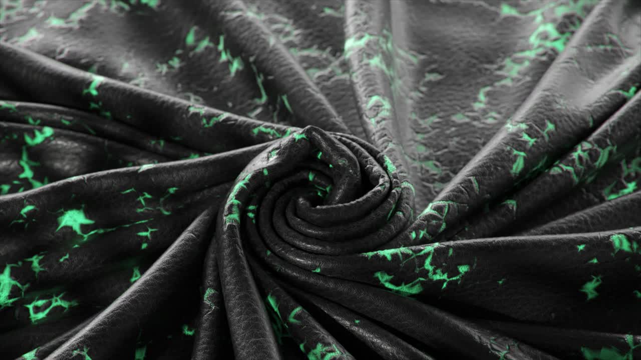 초록색 패턴을 가진 어두운 직물의 근접 시각