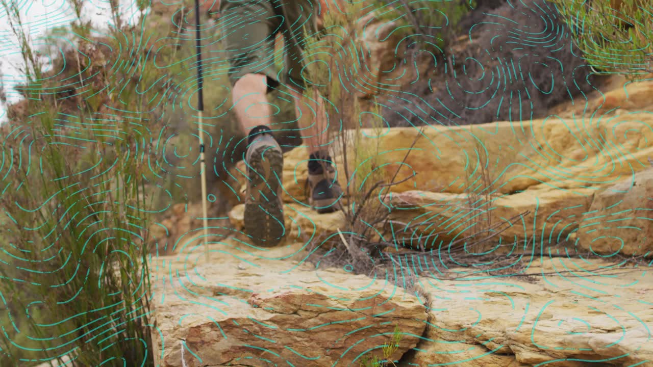 Adventure hiker shifting weight gripping pole and lifting boot onto sandstone ledge gaining height