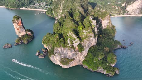 rocky mountains on the krabi shore with tropical climate. aerial ao nang, thailand