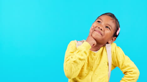 Thinking,-smile-and-girl-child-in-studio