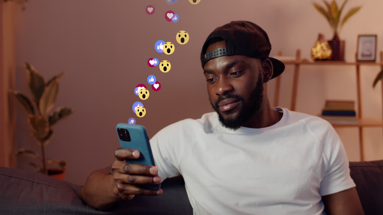 Man interacting with social media on smartphone, showing floating reactions