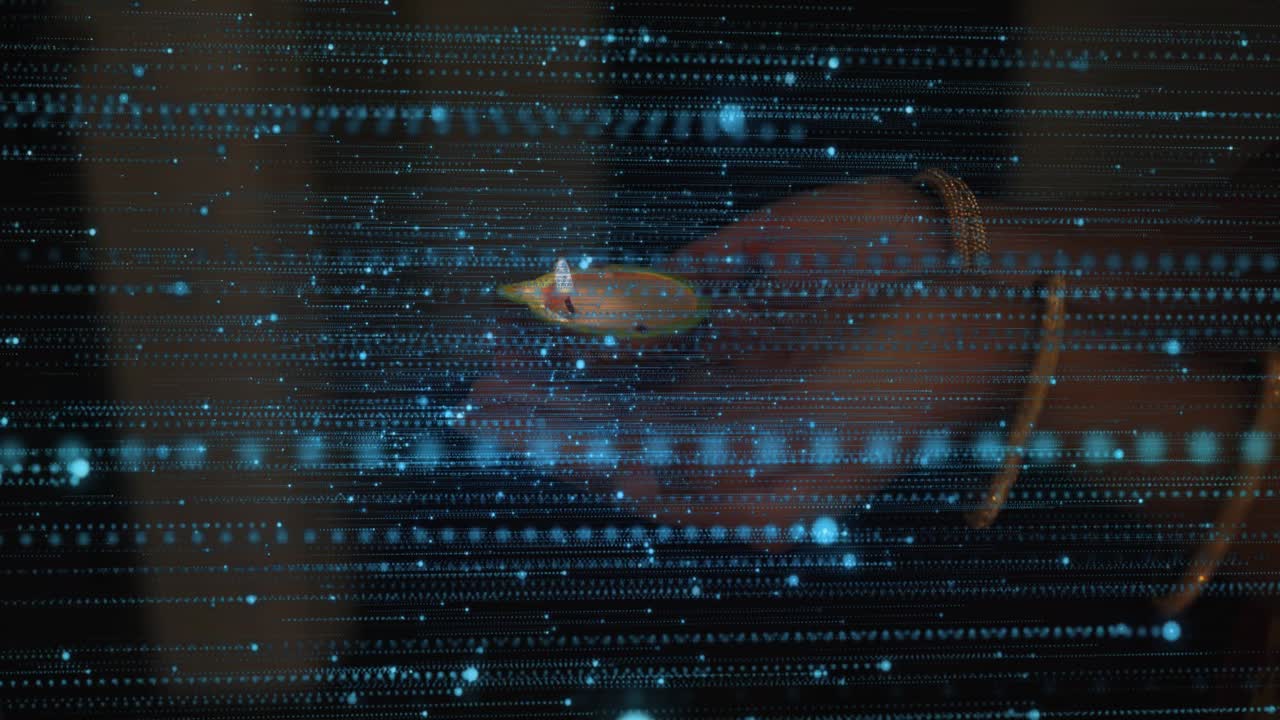 Female hands entering frame and holding diya, blue-green particles passing through palms for ritual