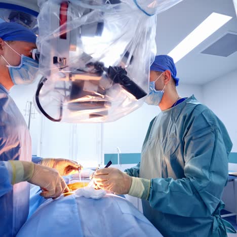surgical team operating patient