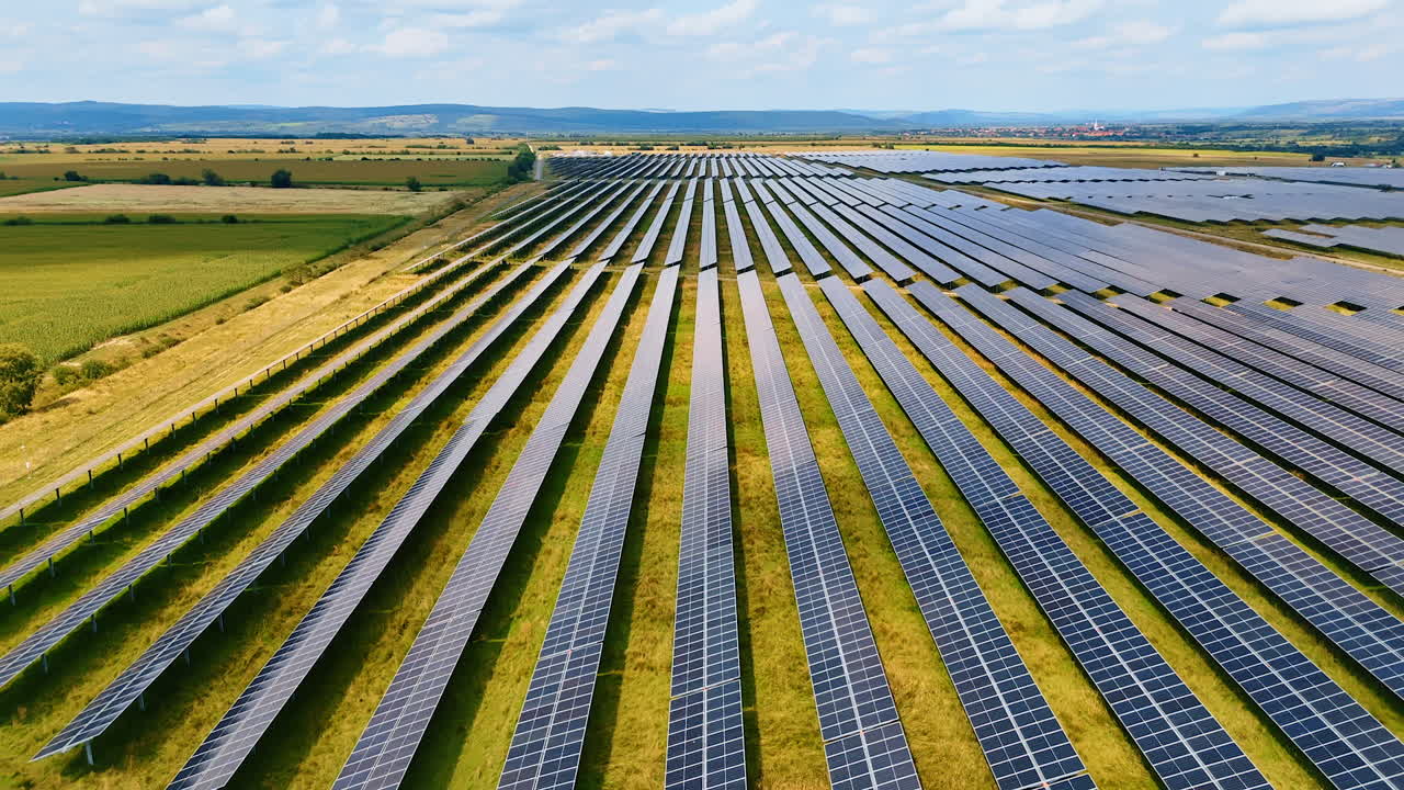 Expansive solar field installation. Massive lines of solar panels designed to generate clean power efficiently