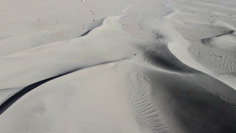 aerial top down view of sand dunes in the cold desert of skardu pakistan on a sunny summer day