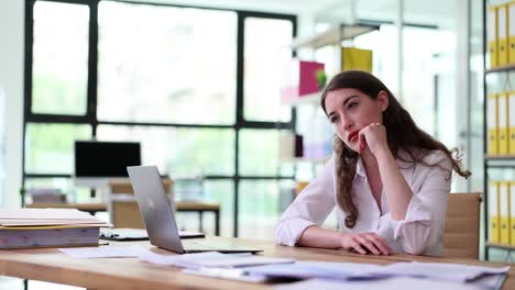 Stressed woman in the office