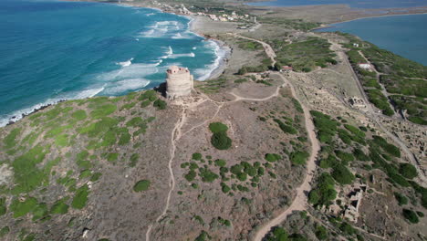 torre di san giovanni di sinis, sardinia: flying over the famous tower and seeing a spectacular landscape