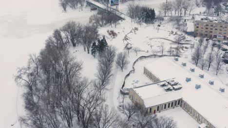 Aerial-reveal-of-The-Forks-skating-trails-in-Winnipeg-Manitoba-Canada