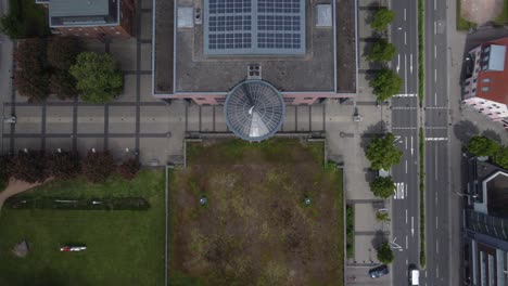 aerial top-down of public building powered by solar panels energy, kaiserslautern