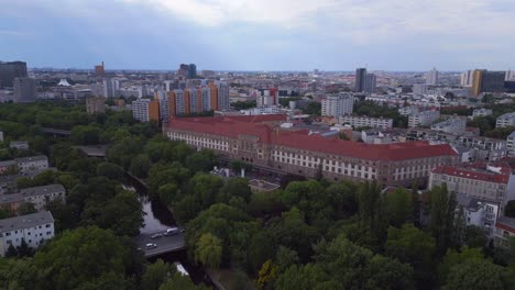 Great-aerial-top-view-flight-European-Patent-Office,-city-Berlin-Germany-Summer-day-2023