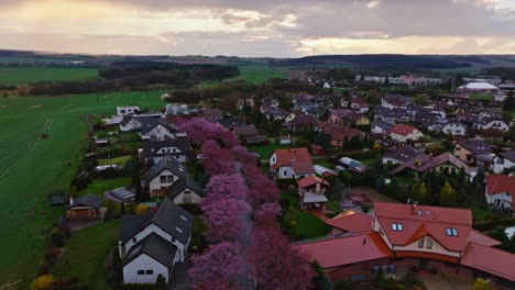 aerial drone flyover svitavy riverside town in czech republic with colorful trees and houses, 4k