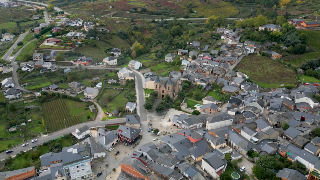 Drone aerial of Nuestra Señora de Fátima church in A Rúa, Galicia, showing layout and surroundings