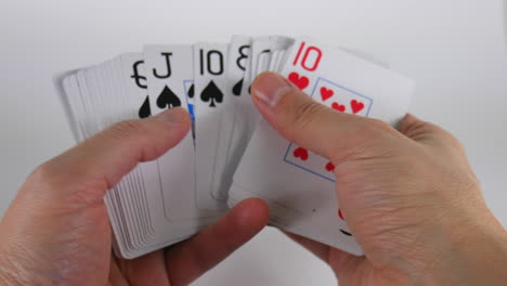 Jugando-A-Las-Cartas-En-Las-Manos,-Cubierta,-Casino,-Jugar,-Apostar,-Juegos-De-Azar,-Póquer,-Veintiuna,-Conjunto,-Ilustración,-Pala,-Juguetón,-Jugador,-Apuestas