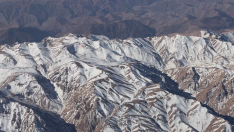 snow-capped mountain ranges aerial view